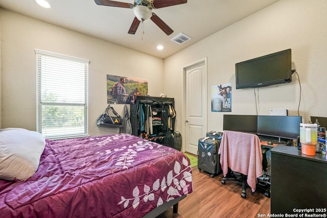 4603 Camden, San Antonio, TX 78261 - bedroom featuring wood finished floors, recessed lighting, and ceiling fan