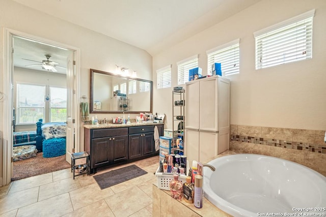 4603 Camden, San Antonio, TX 78261 - ensuite bathroom featuring vanity, a garden tub, healthy amount of natural light, and ceiling fan