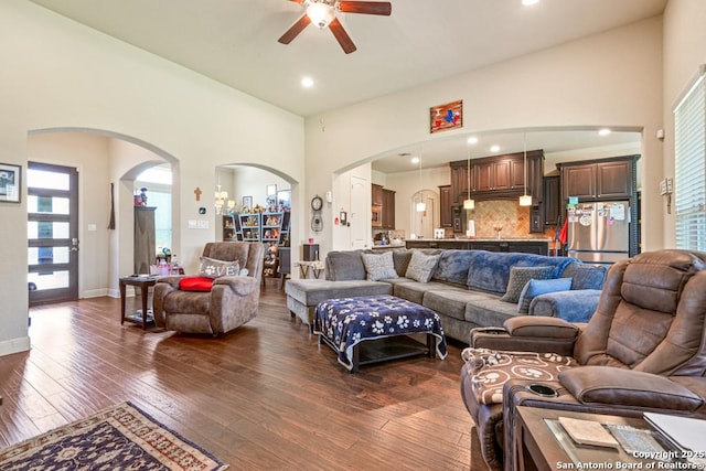 4603 Camden, San Antonio, TX 78261 - living area with arched walkways, a ceiling fan, dark wood finished floors, recessed lighting, and a high ceiling