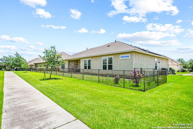 4603 Camden, San Antonio, TX 78261 - back of property with stucco siding and a shingled roof