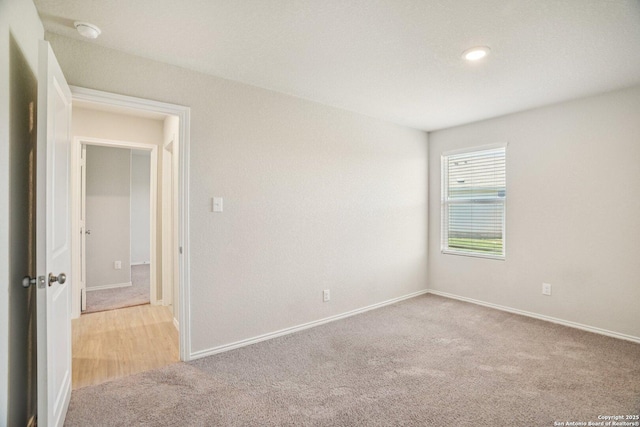 6407 Ignacio, San Antonio, TX 78220 - spare room featuring carpet, a smoke detector, and recessed lighting