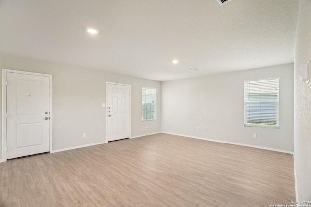 6407 Ignacio, San Antonio, TX 78220 - empty room featuring light wood-type flooring and recessed lighting