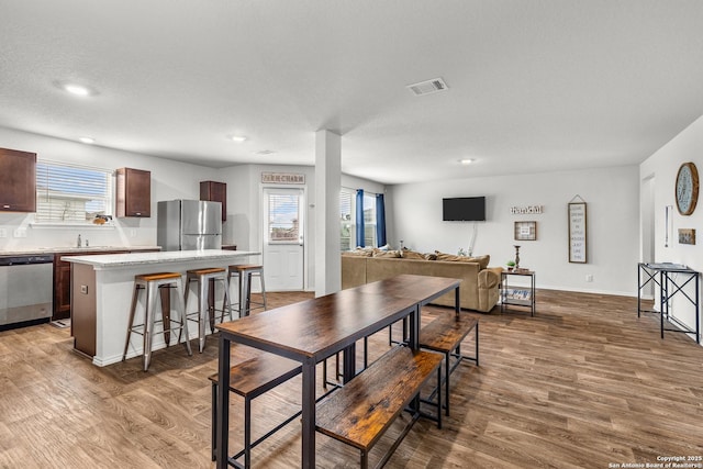 1006 Pacific Monarch, San Antonio, TX 78253 - dining space featuring wood finished floors, healthy amount of natural light, and recessed lighting