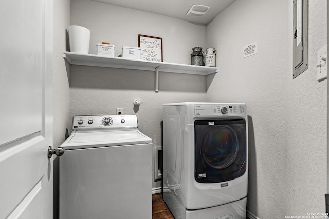 1006 Pacific Monarch, San Antonio, TX 78253 - laundry room featuring washer and clothes dryer and dark wood finished floors