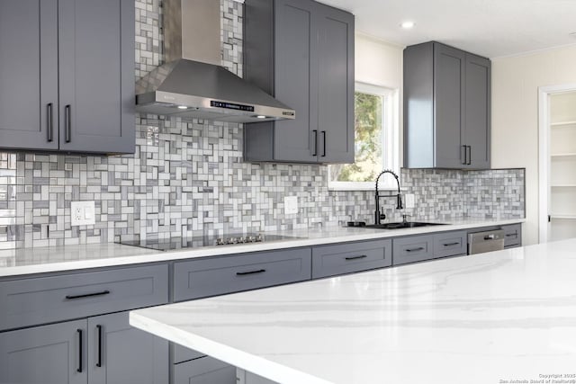 2165 Colleen Dr, Canyon Lake, TX 78133 - kitchen with wall chimney exhaust hood, gray cabinets, decorative backsplash, black electric cooktop, and light stone counters