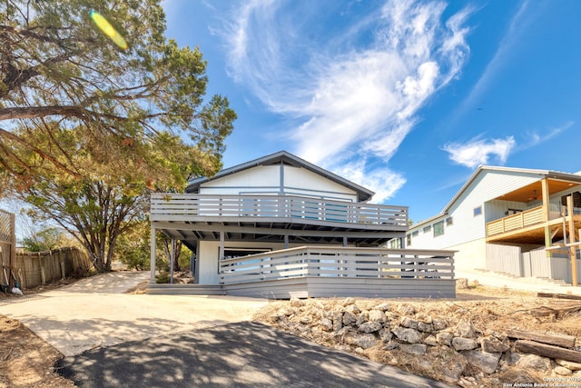 2165 Colleen Dr, Canyon Lake, TX 78133 - view of front of property featuring driveway, a carport, and a wooden deck
