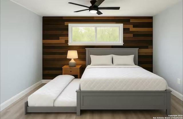 2165 Colleen Dr, Canyon Lake, TX 78133 - bedroom with wooden walls, wood finished floors, and a ceiling fan