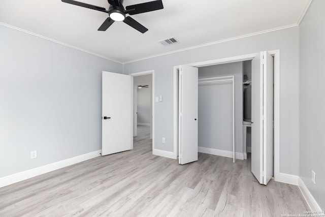 2165 Colleen Dr, Canyon Lake, TX 78133 - unfurnished bedroom with crown molding, wood finished floors, a ceiling fan, and a closet