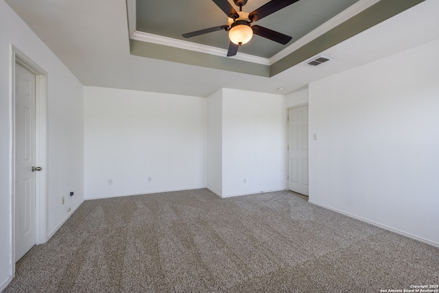 11922 Briarton Wls, San Antonio, TX 78254 - carpeted empty room with a raised ceiling, ceiling fan, and crown molding