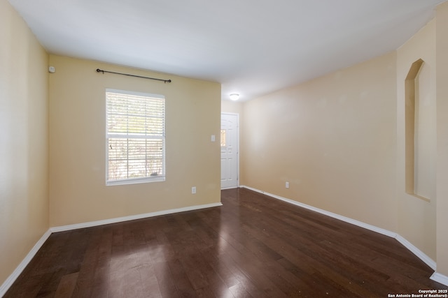 11922 Briarton Wls, San Antonio, TX 78254 - empty room with dark wood-style flooring and baseboards