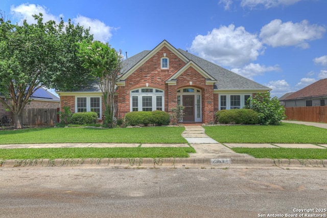 2363 Oak Pebble, New Braunfels, TX 78132 - traditional-style house with brick siding and roof with shingles