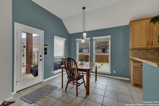 2363 Oak Pebble, New Braunfels, TX 78132 - dining room with vaulted ceiling and light tile patterned floors