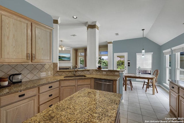 2363 Oak Pebble, New Braunfels, TX 78132 - kitchen with light brown cabinetry, dishwasher, tasteful backsplash, light tile patterned flooring, and healthy amount of natural light