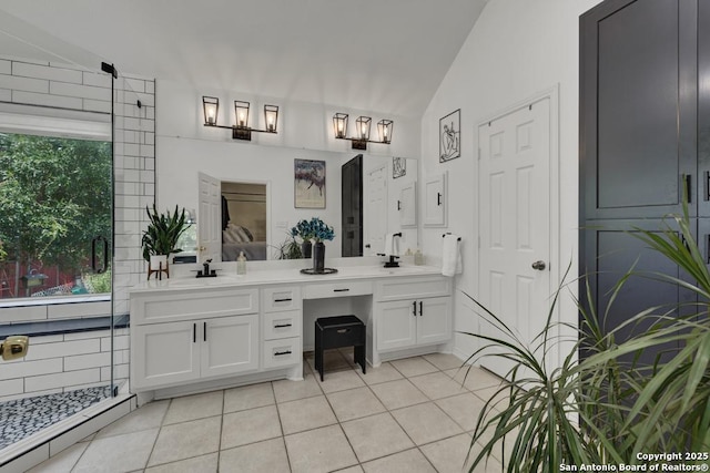 2363 Oak Pebble, New Braunfels, TX 78132 - full bath featuring double vanity, lofted ceiling, tile patterned flooring, and a shower stall