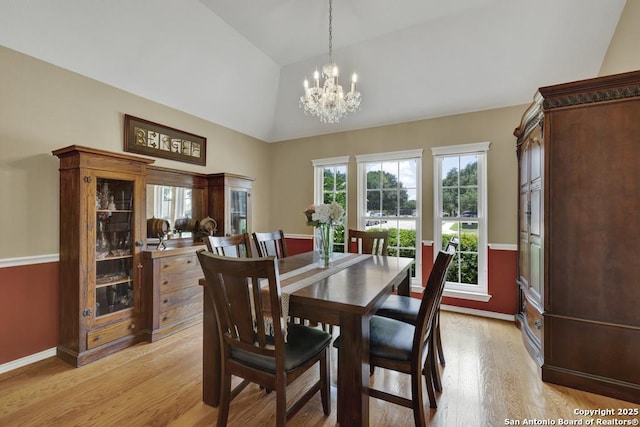 2363 Oak Pebble, New Braunfels, TX 78132 - dining space with lofted ceiling, a chandelier, and light wood finished floors