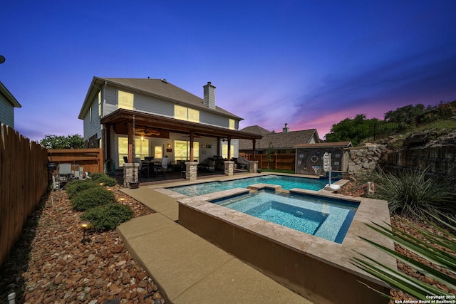 20926 Encino Dawn, San Antonio, TX 78259 - view of swimming pool featuring a fenced backyard, a patio, ceiling fan, and a pool with connected hot tub