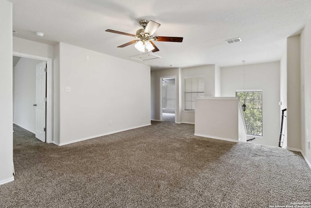 10107 Roseangel, Helotes, TX 78023 - unfurnished room featuring attic access, carpet floors, and ceiling fan