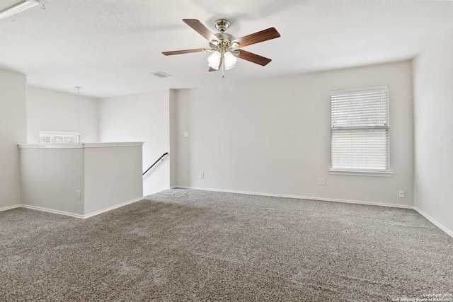 10107 Roseangel, Helotes, TX 78023 - carpeted spare room with ceiling fan and baseboards