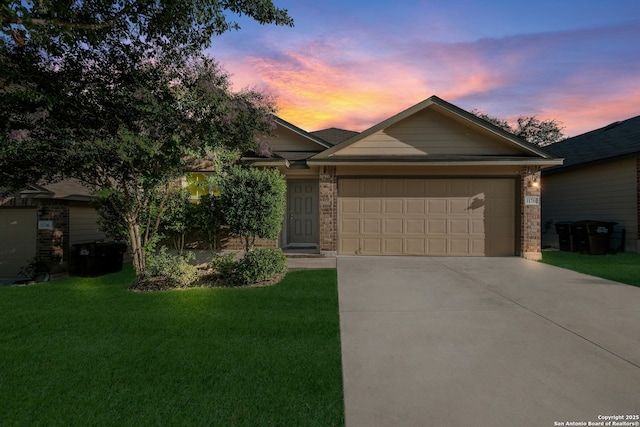 11750 Caraway, San Antonio, TX 78245 - ranch-style home with driveway, an attached garage, brick siding, and a lawn