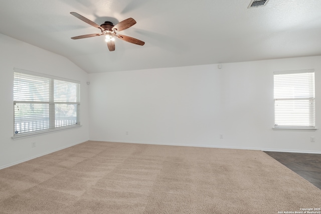 11750 Caraway, San Antonio, TX 78245 - carpeted empty room featuring a ceiling fan, plenty of natural light, and vaulted ceiling