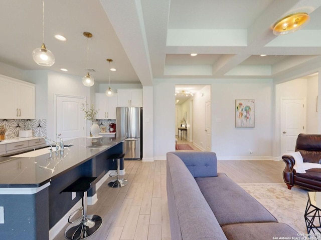 7621 Cypress, Boerne, TX 78015 - living room featuring recessed lighting, coffered ceiling, light wood finished floors, and beamed ceiling
