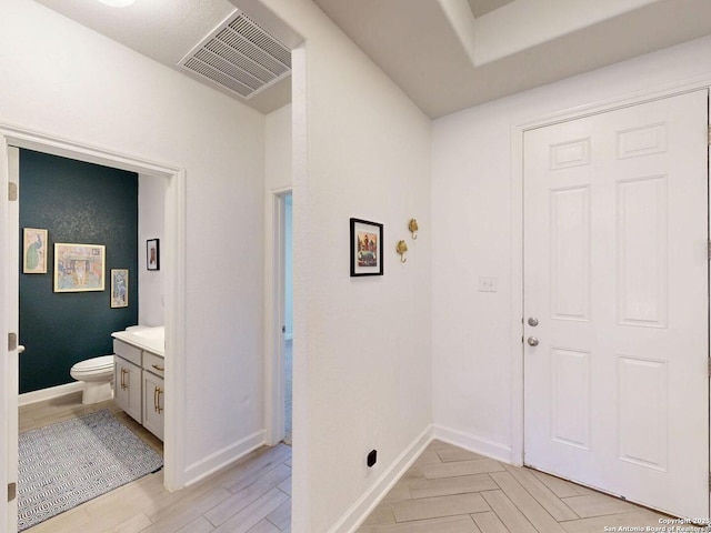 7621 Cypress, Boerne, TX 78015 - entrance foyer featuring baseboards and light wood-type flooring