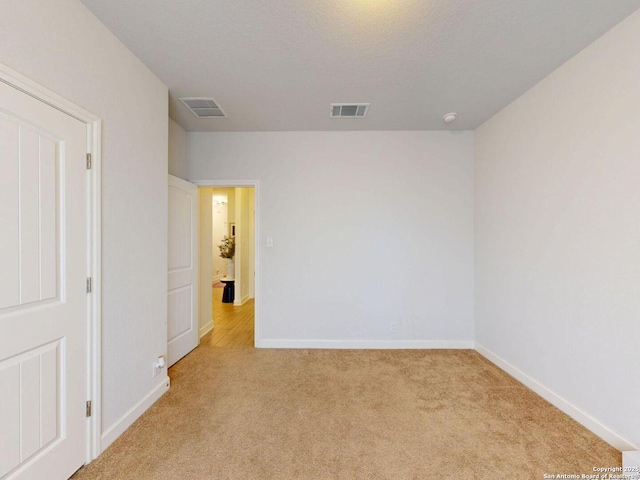 7621 Cypress, Boerne, TX 78015 - unfurnished bedroom with carpet and baseboards