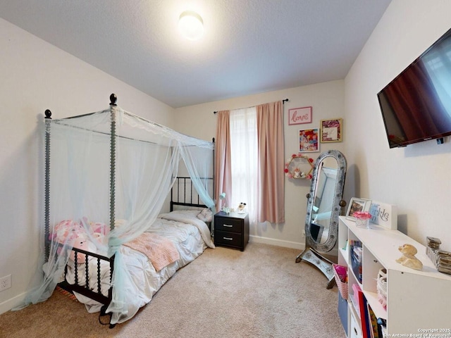 7621 Cypress, Boerne, TX 78015 - bedroom with light carpet and baseboards