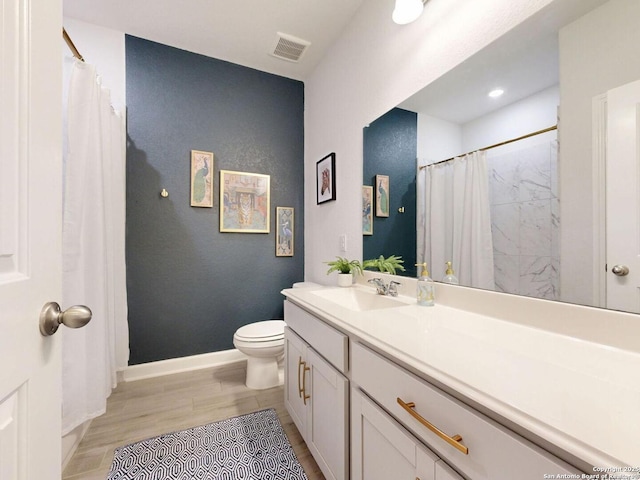 7621 Cypress, Boerne, TX 78015 - bathroom with wood finished floors, vanity, and a shower with curtain