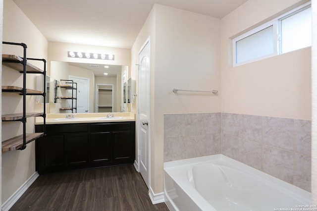 13027 Maestro Spark, San Antonio, TX 78252 - full bathroom with wood finished floors, a bath, and double vanity
