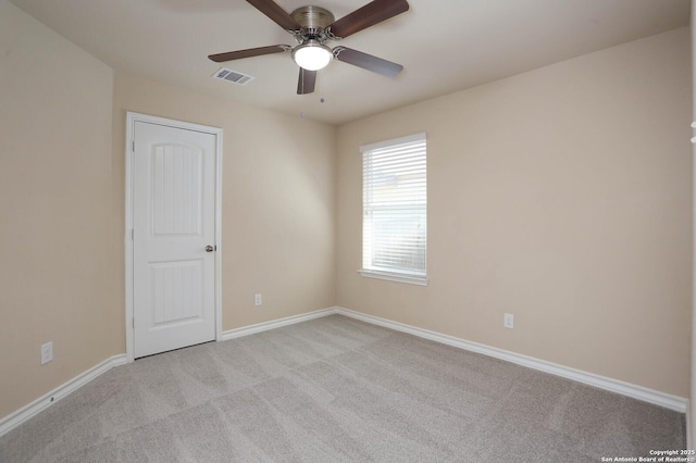 13027 Maestro Spark, San Antonio, TX 78252 - empty room with light carpet and ceiling fan