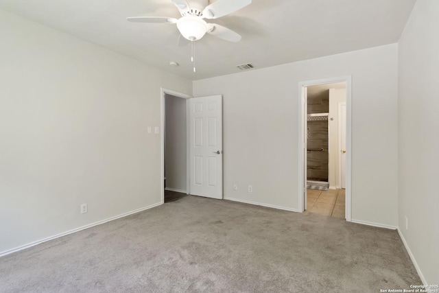 8611 Shaenfield, San Antonio, TX 78254 - unfurnished bedroom featuring carpet flooring, connected bathroom, and ceiling fan