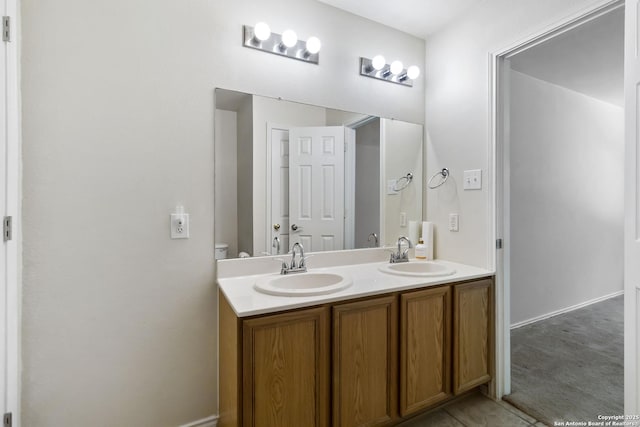 8611 Shaenfield, San Antonio, TX 78254 - full bathroom featuring double vanity and baseboards