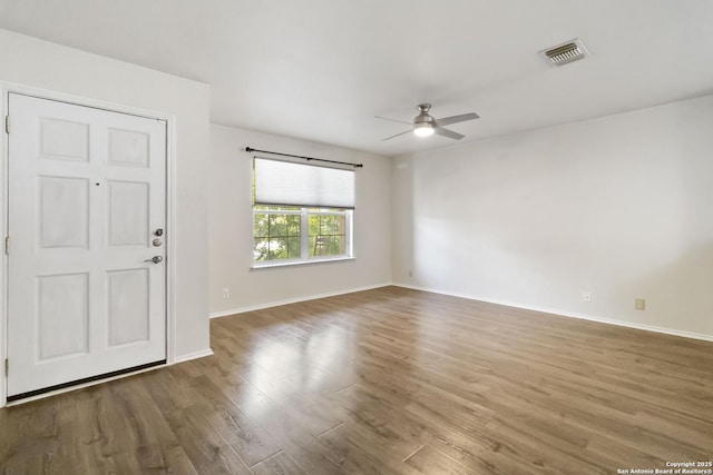 8611 Shaenfield, San Antonio, TX 78254 - spare room featuring a ceiling fan and wood finished floors