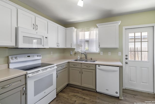 8611 Shaenfield, San Antonio, TX 78254 - kitchen featuring white appliances, light countertops, dark wood-style floors, and white cabinets