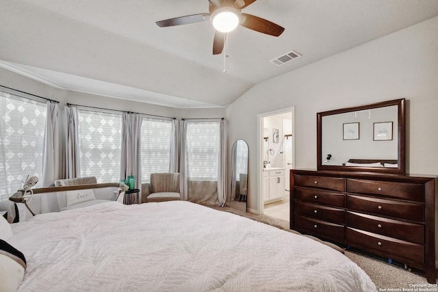 13019 Louberg, San Antonio, TX 78253 - bedroom featuring light carpet, vaulted ceiling, ceiling fan, and ensuite bath