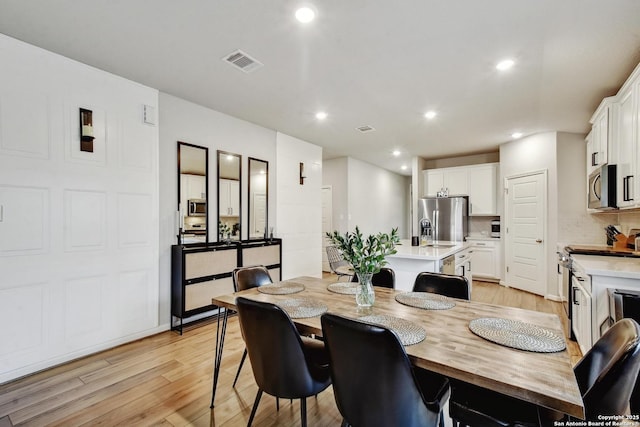 13019 Louberg, San Antonio, TX 78253 - dining room featuring light wood-style flooring and recessed lighting