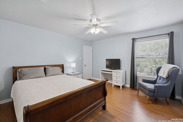 2723 Sierra Salinas, San Antonio, TX 78259 - bedroom with wood finished floors and ceiling fan