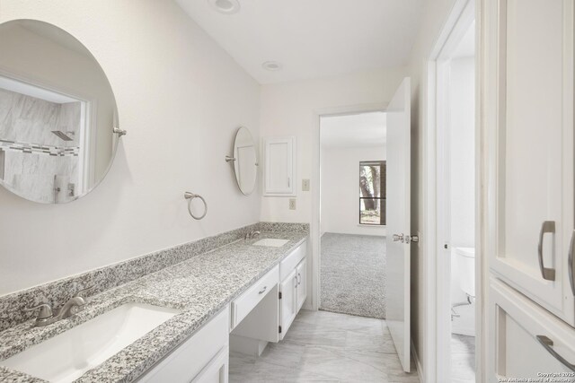 114 Crystal Cyn, Universal City, TX 78148 - bathroom featuring marble finish floors and double vanity