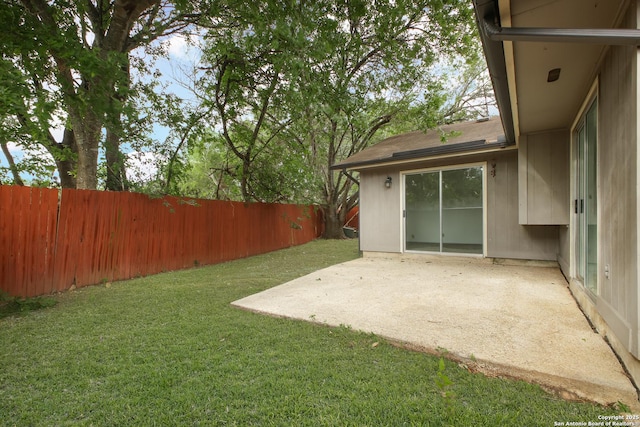 114 Crystal Cyn, Universal City, TX 78148 - fenced backyard with a patio