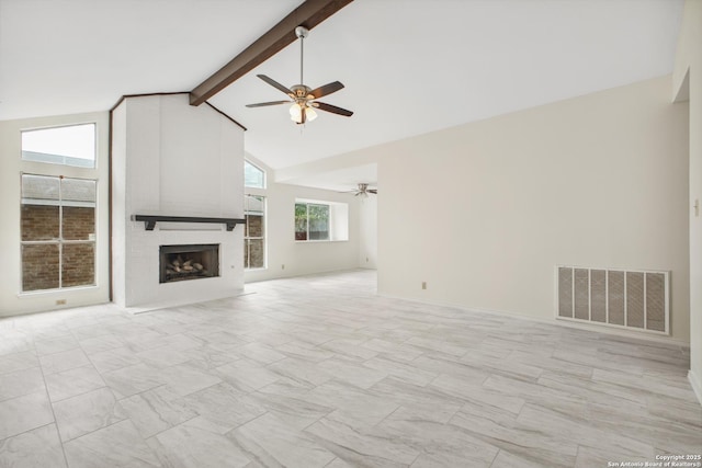 114 Crystal Cyn, Universal City, TX 78148 - unfurnished living room with a ceiling fan, beamed ceiling, a fireplace, and high vaulted ceiling