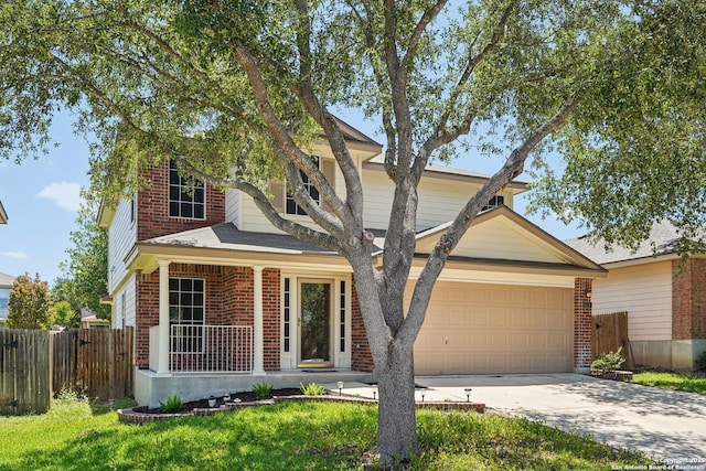 614 Granite Clf, San Antonio, TX 78251 - traditional-style house featuring a porch, brick siding, concrete driveway, and an attached garage