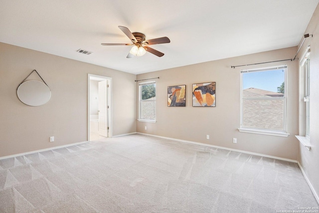 614 Granite Clf, San Antonio, TX 78251 - spare room with a ceiling fan and light carpet