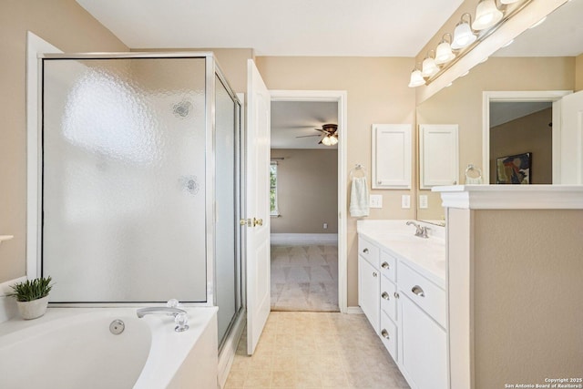 614 Granite Clf, San Antonio, TX 78251 - bathroom featuring vanity, a stall shower, a garden tub, and a ceiling fan