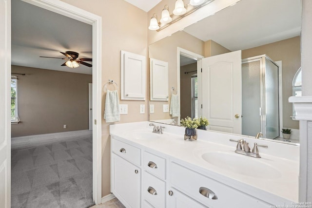 614 Granite Clf, San Antonio, TX 78251 - bathroom featuring healthy amount of natural light, double vanity, a shower stall, and ceiling fan
