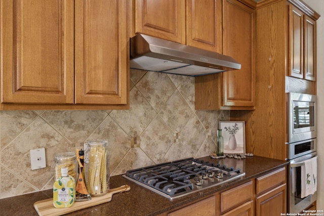 3535 Arroyo Grande, San Antonio, TX 78253 - kitchen featuring stainless steel appliances, under cabinet range hood, decorative backsplash, and brown cabinetry