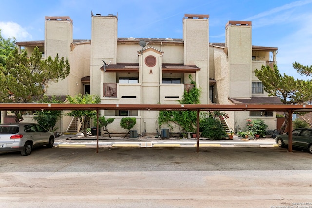 5322 Medical Unit A102, San Antonio, TX 78240 - view of building exterior with stairs and covered parking