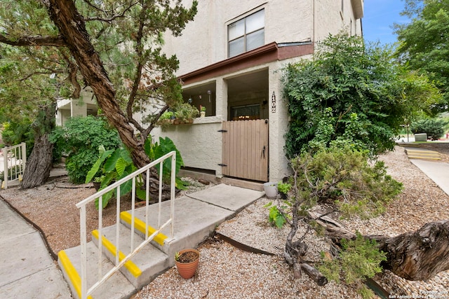 5322 Medical Unit A102, San Antonio, TX 78240 - property entrance with stucco siding and a gate