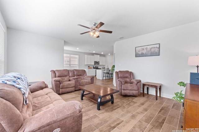 3415 Iron Cyn, Bulverde, TX 78163 - living room with a ceiling fan, light wood finished floors, and recessed lighting