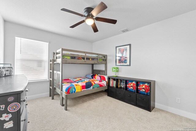 3415 Iron Cyn, Bulverde, TX 78163 - bedroom featuring carpet and ceiling fan